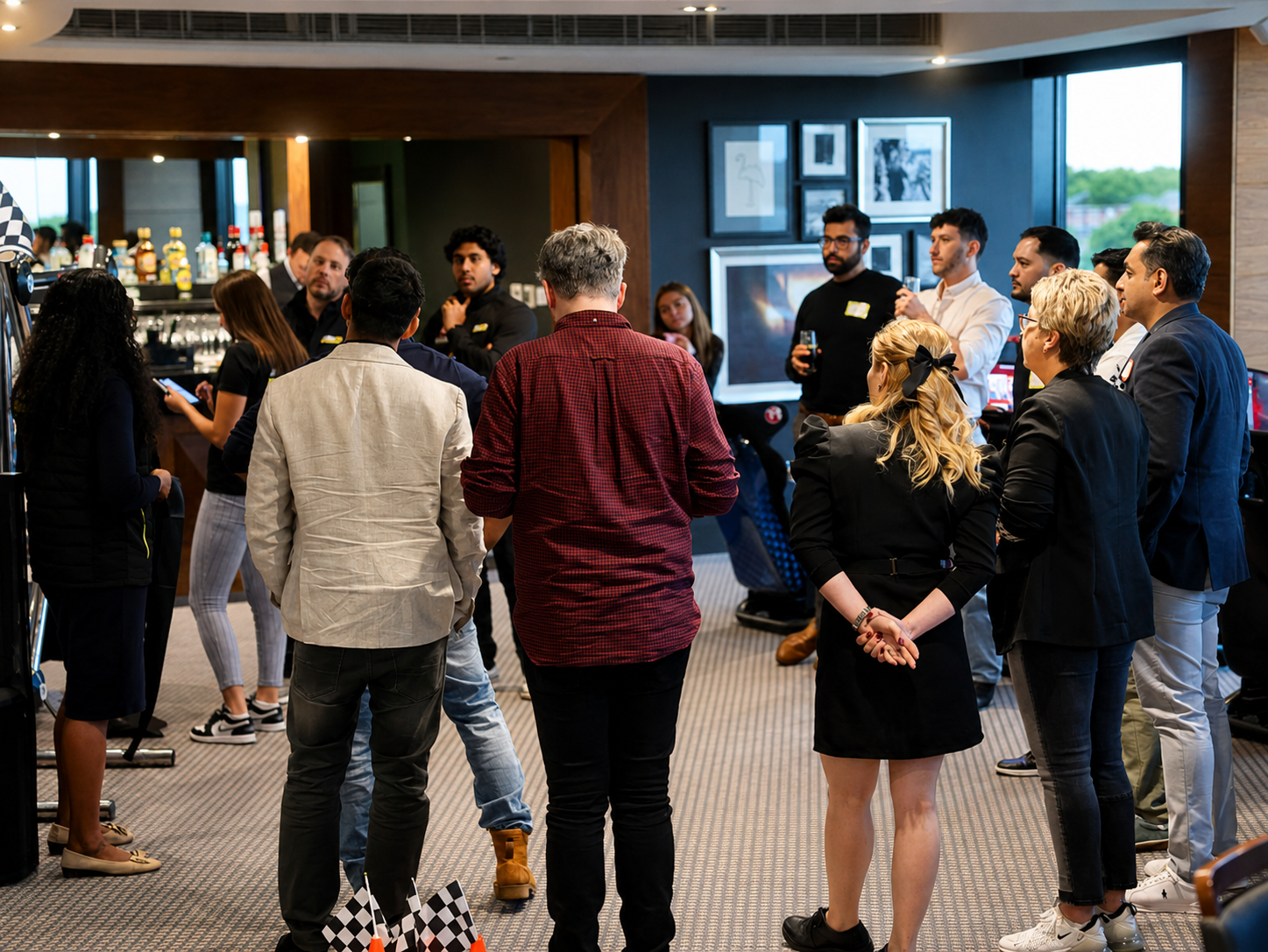 Axcel Group attendees gathered around the event experience