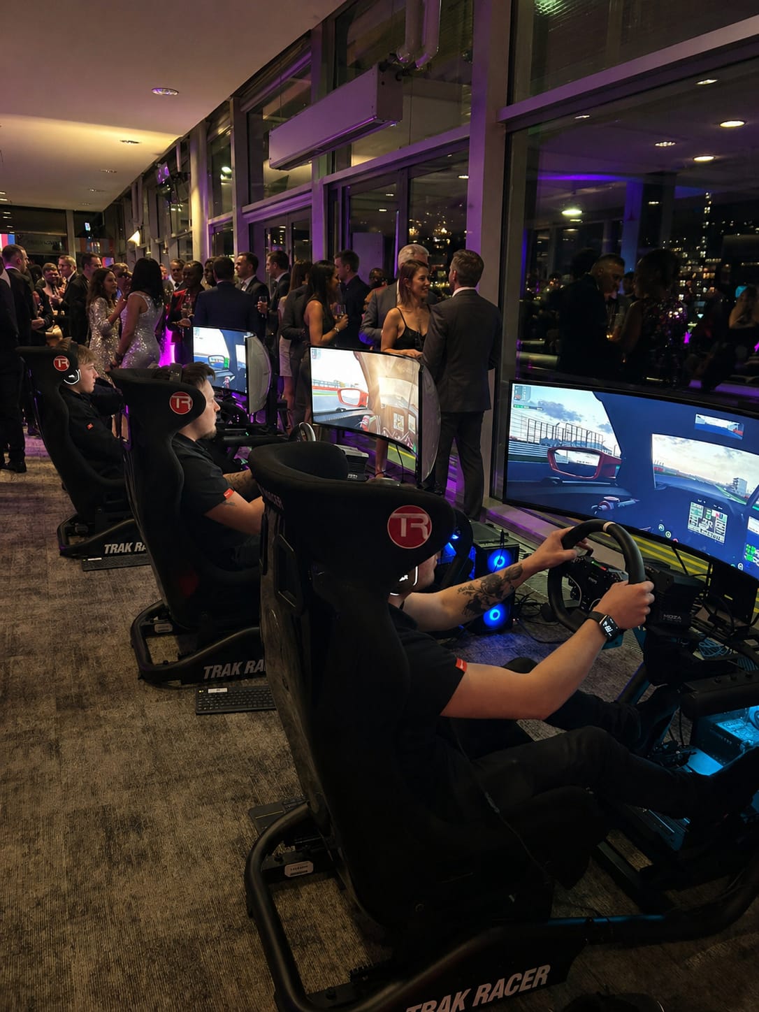 Multi-simulator race setup at a corporate event